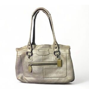 COACH - Penelope No F14686
Pebbled Gold leather handbag
Purple Interior